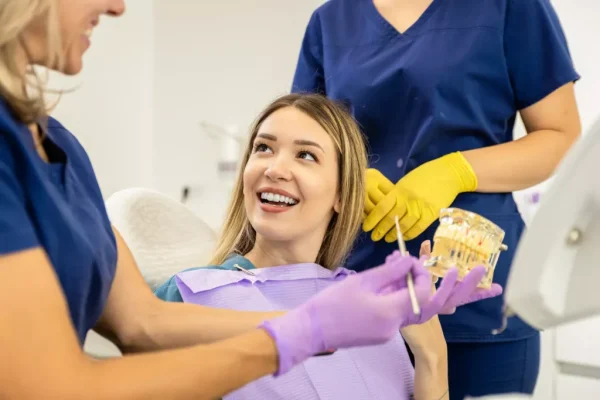 female-dentist-with-assistant-working-in-dental-cl-2026-01-08-00-11-38-utc-1024x683.webp